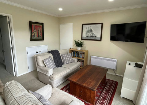 There is a wall-mounted panel heater to keep you warm in winter.