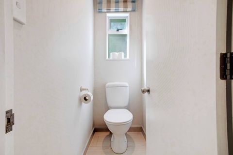 The toilet is separate from the bathroom which is handy for families.
