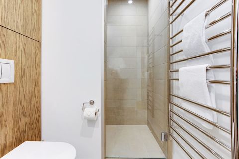 Step out of the shower and enjoy warm fluffy towels from the heated towel rail.