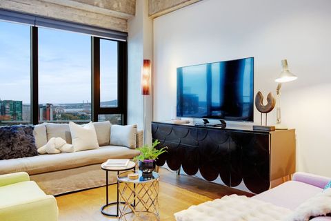 Relax on the couch and watch TV or read a book.