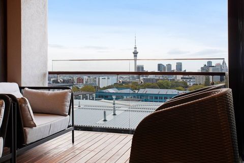 Take in the sights from the balcony overlooking the city below.
