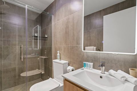 The lighted mirror is very handy for make-up application.