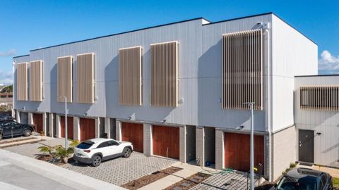 There is parking outside the townhouse.