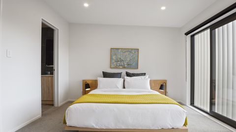 Climb into bed under the crisp white sheets and snuggly throw.