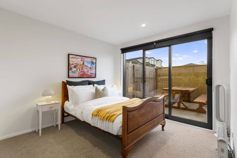 The downstairs bedroom has a table outside the ranch slider doors.