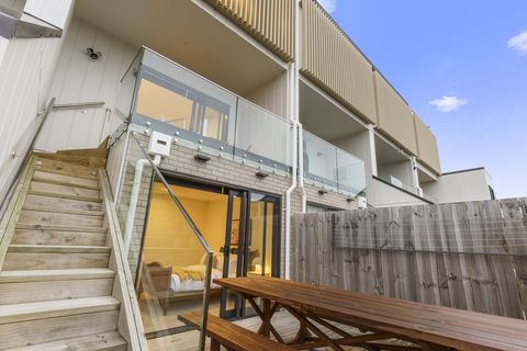 There is outdoor access to the lower deck and bedroom.