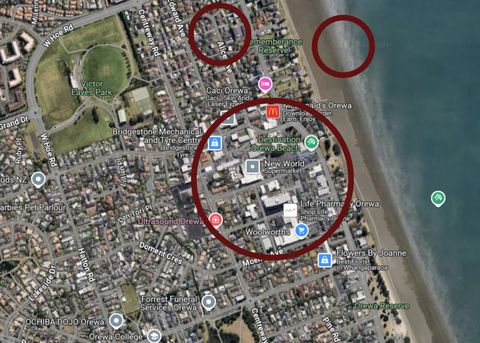 The house is located in the top circle vicinity near Orewa township and beach.