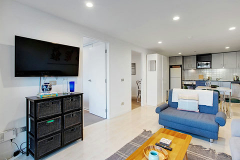 Sit on the couch and watch TV or read a book.