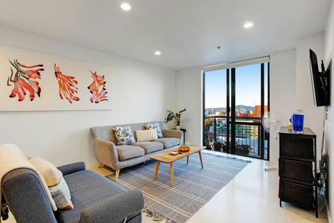 There is some lovely artwork on the wall that matches the floral theme.