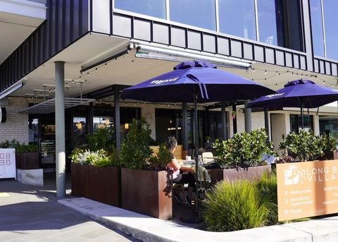 The Long Bay village has restaurants, bars and supermarkets.