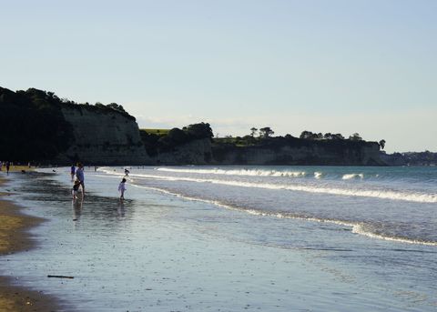 The- Long Bay beach has lovely golden sand and clear water.