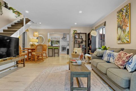 Sit on the couch and watch TV.