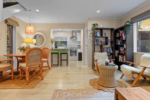 There is a great bookshelf with cosy seating area to sit in the sun and read a book.