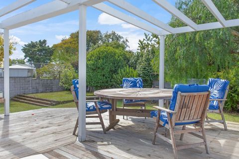 The deck has different seating areas, this one would be great for eating al-fresco style.