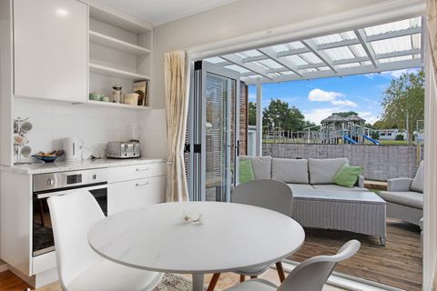 The kitchen toaster, kettle and extra oven are set-up in the dining space.