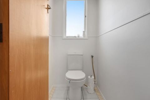 The toilet is beside the bathroom, which is really handy for a larger family/group.