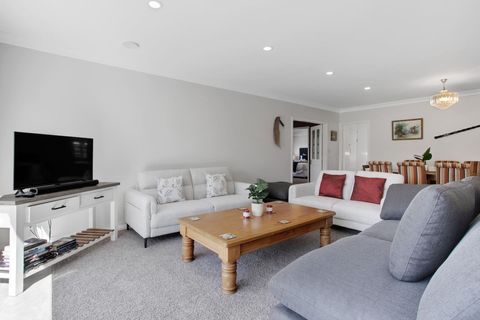 Relax on the couch and watch TV or read a book.