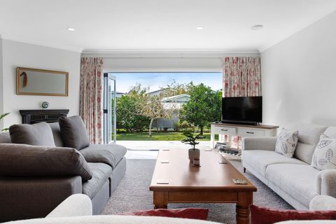 There is great indoor/outdoor flow onto another deck from this living room.