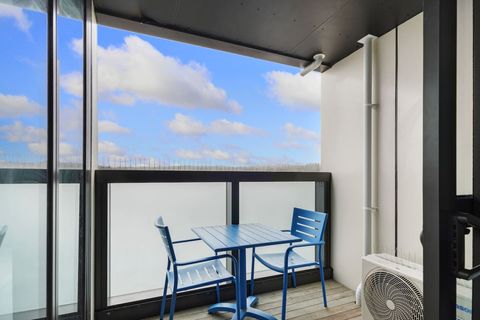 The balcony is covered and expands the living space with great indoor/outdoor flow.