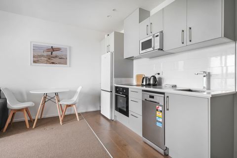 The kitchen is well laid out, with plenty of cupboards for storage.