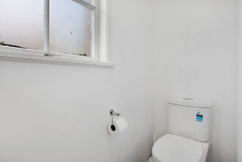 The toilet is in a separate room in the bathroom where you can shut the door.