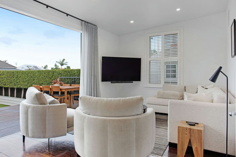 Relax on the couch and watch TV or read a book.