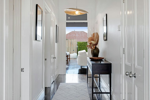 View from the front door looking towards the back of the house and backyard.