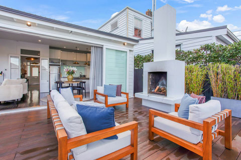 The fireplace adds warmth for cooler nights so you can extend your outdoor living.