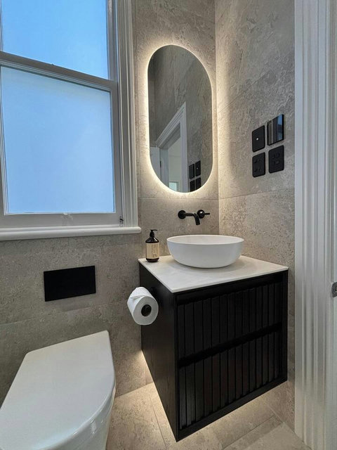 There is plenty of storage in the bathroom cupboards.