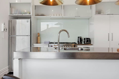 There is plenty of prep space in the kitchen if you wish to cook.