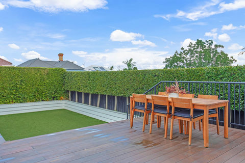 Choose from either the dining setup or relaxing on the outdoor lounge furniture.