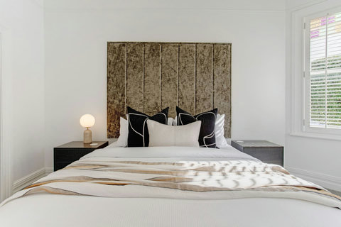 Having an ensuite bathroom makes this room feel like a hotel suite.