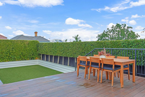 Choose from either the dining setup or relaxing on the outdoor lounge furniture.