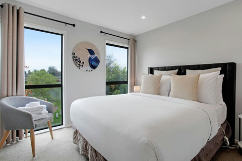 There is plenty of natural light that streams into the main bedroom.
