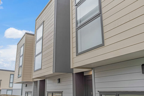 View of the townhouse, which is set amongst similar houses of this quality.