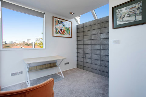 There is lots of light and great views in this foyer area where the desk is located.