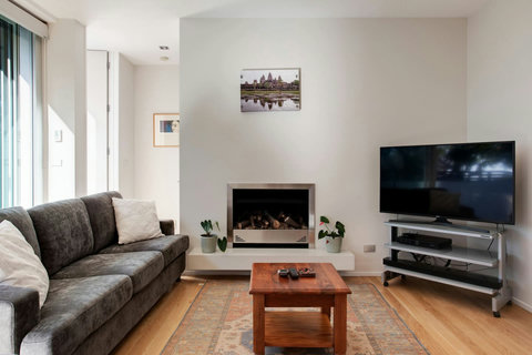 Relax on the couch and watch TV or read a book.