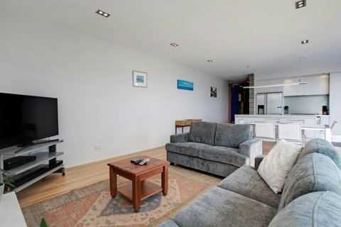 Great open-plan living spaces include the lounge, dining area and kitchen.