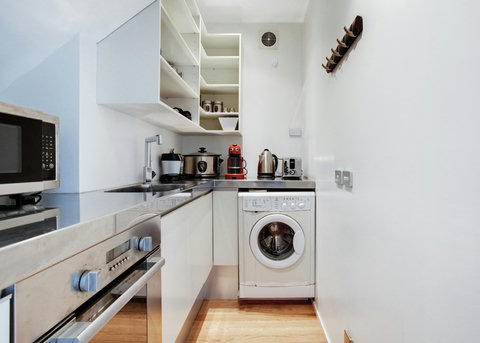 The microwave, second oven, washing machine and other appliances are in the Butlers Pantry.