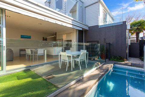 View of the back of the house fully open to the outside.