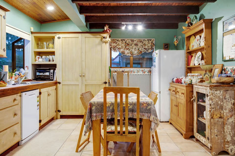 The kitchen has everything you need to create family meals including an oven, dishwasher, cooktop, microwave and fridge/freezer.