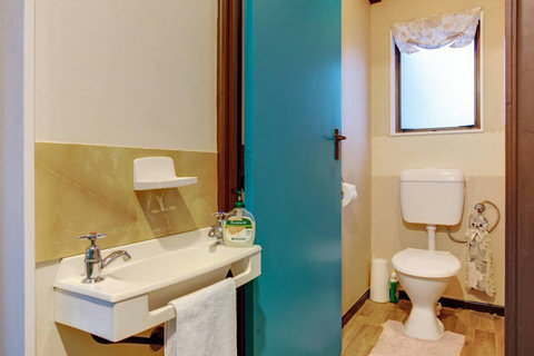 There is a separate toilet with wash basin on the ground floor.