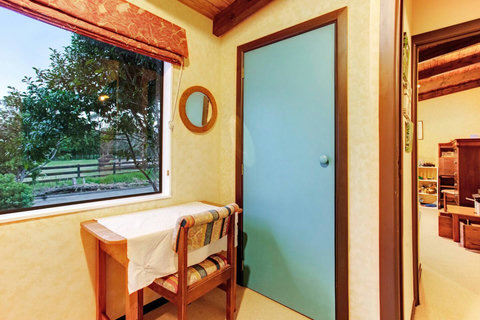 There is a small desk in the bedroom but you have a lovely view out to the garden.