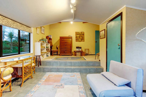 There is a writing desk in the corner that can be used for study or work if needed.