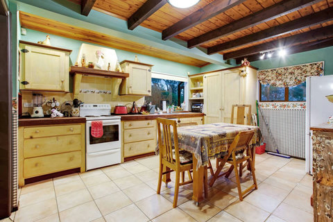 The country kitchen includes the dining table so family meal times are a given.