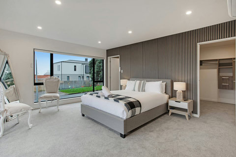 The main bedroom has both a walk-in wardrobe and ensuite bathroom.