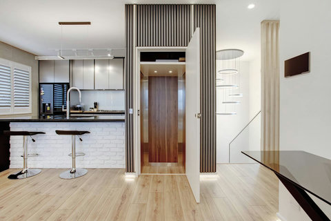 The lift that runs throughout the floors is in the centre of the house.