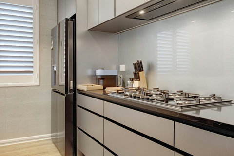 There is a wonderful gas cooker along with plenty of bench space.