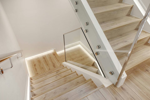 Take the stairs from the top floor to level 1 for the bedrooms.