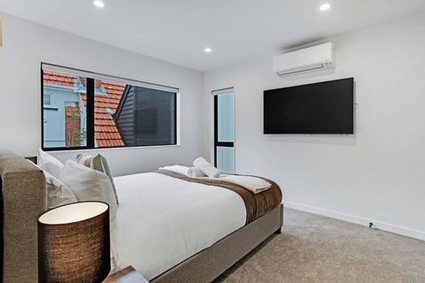 This bedroom also has its own TV and Air-conditioning unit that will keep you cool in Summer and warm in Winter.